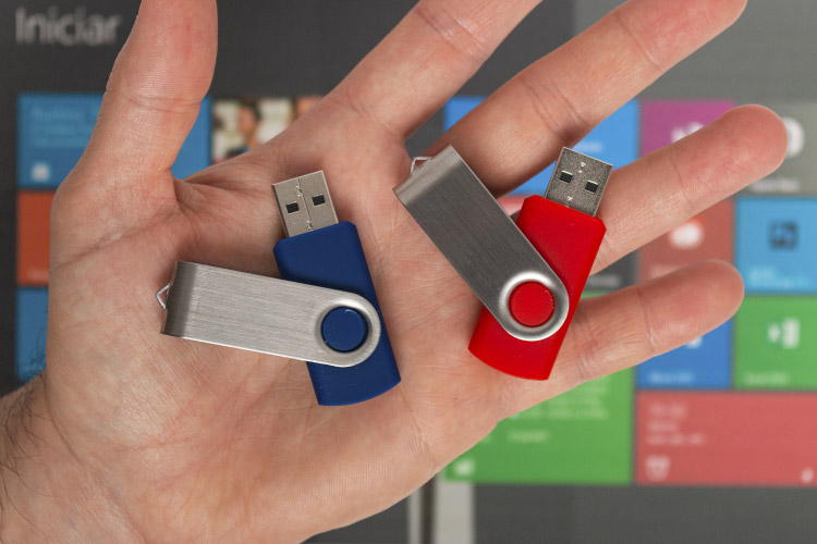 Colorful Flash Drives in palm of hand